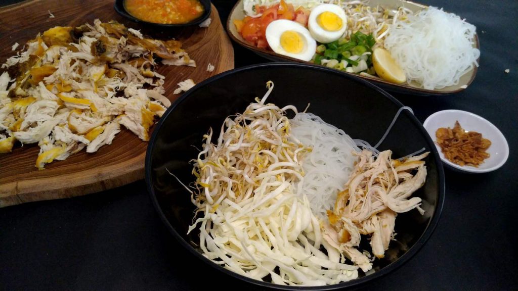 preparing bowl of soto