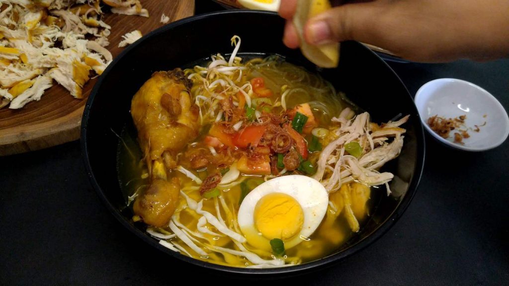 Soto ayam with lemon ready to eat