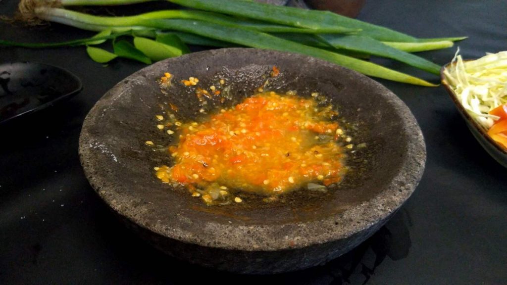 making sambal for soup