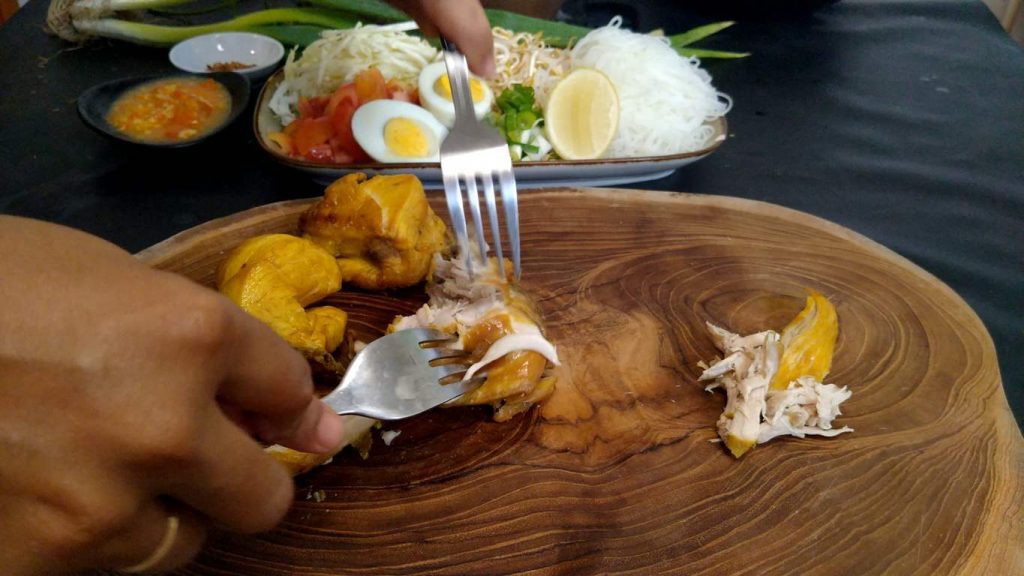 shredding chicken with fork